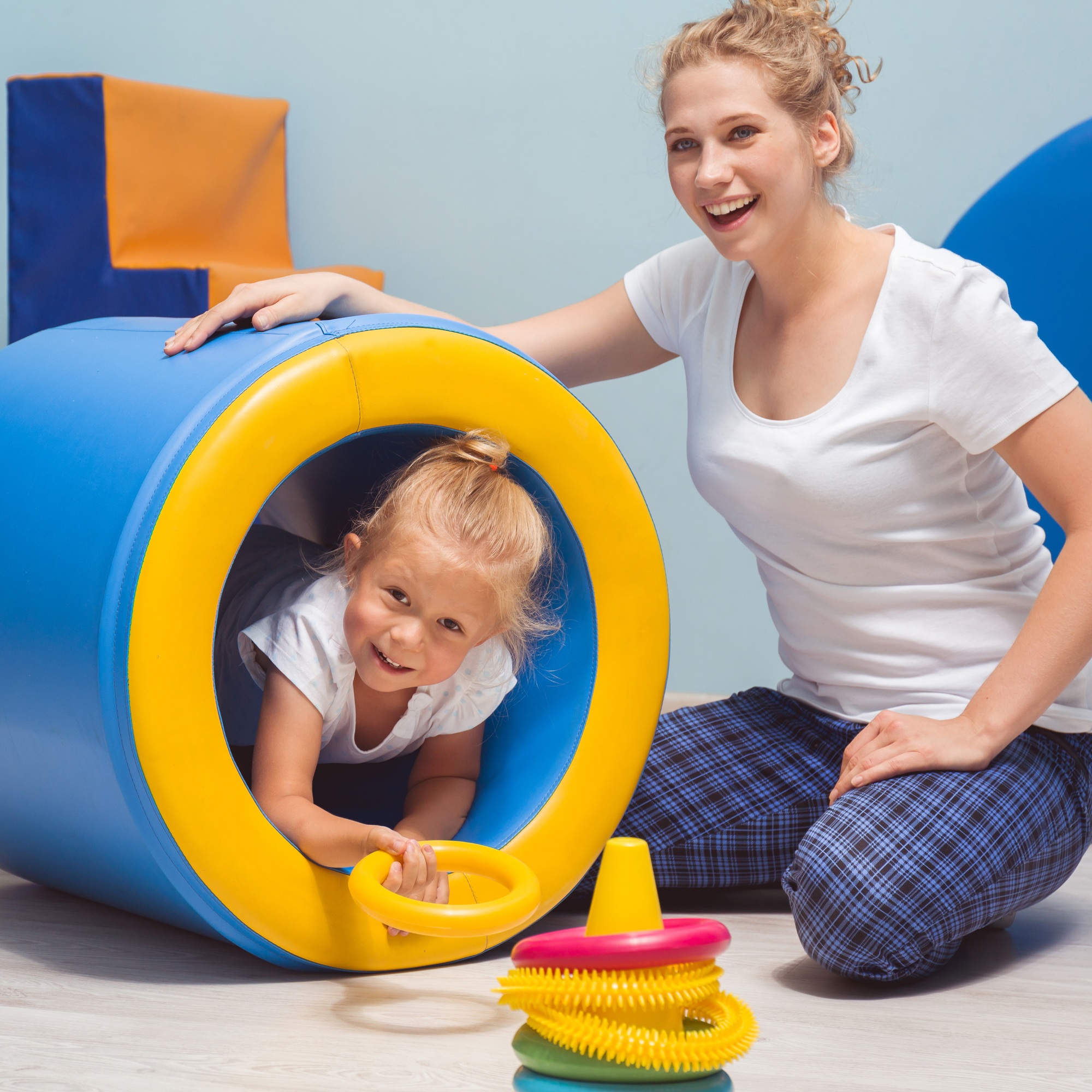 Child exercising during occupational therapy